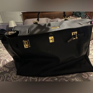 Black Leather Handbag with Gold Accents